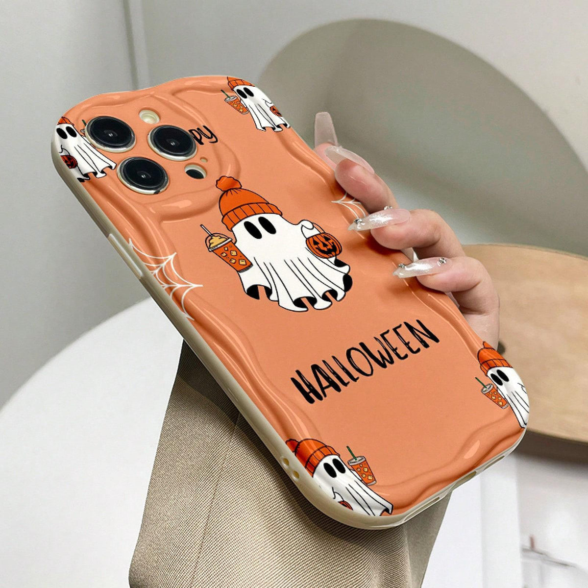 Halloween orange cartoon ghost phone case with hat, featuring a ghost holding a pumpkin lantern and decorated with spider webs. Suitable for 18/17/16/15/14/13/12/11/Plus/Pro/ProMax/Air, S22/23/24/25/26, birthday gifts, holiday gifts, couple phone cases